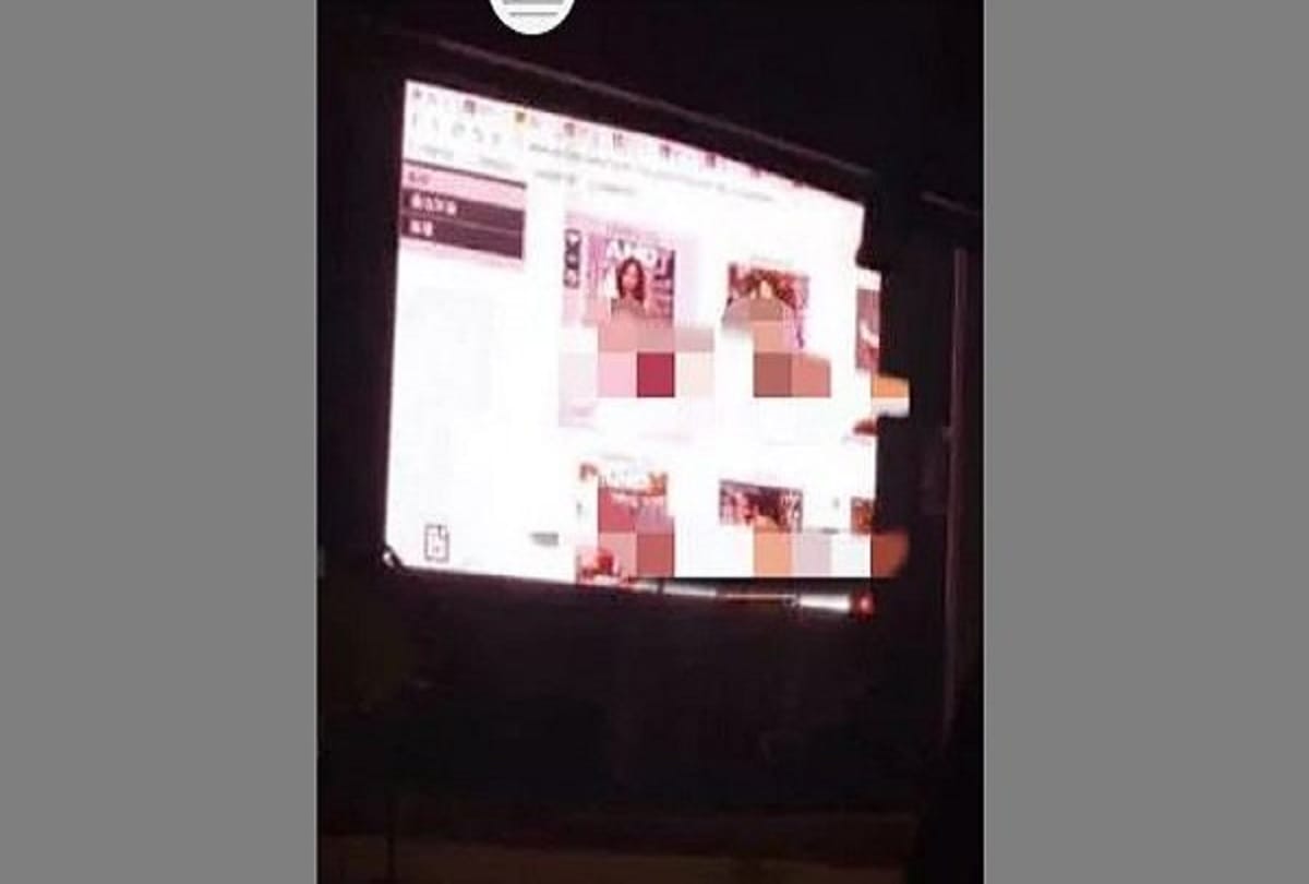 worker plays obscene film on hoarding in china