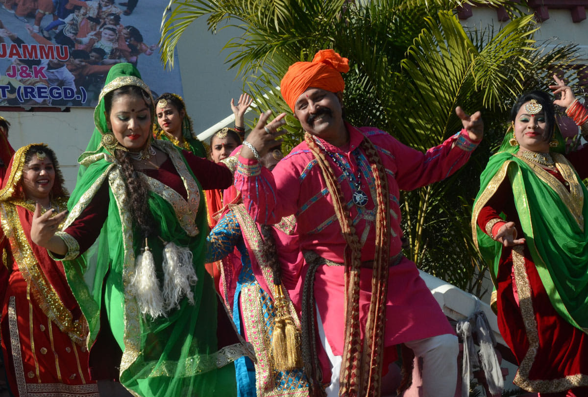 people Celebrating Lohri with fire dancing and singing