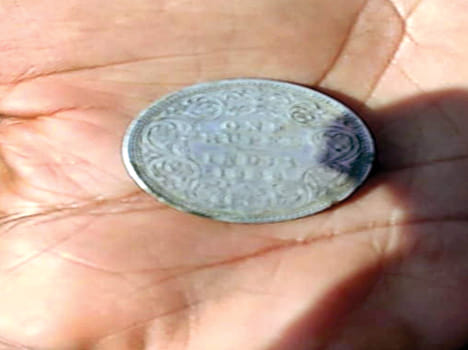Silver coins found in pots during excavation of cattle