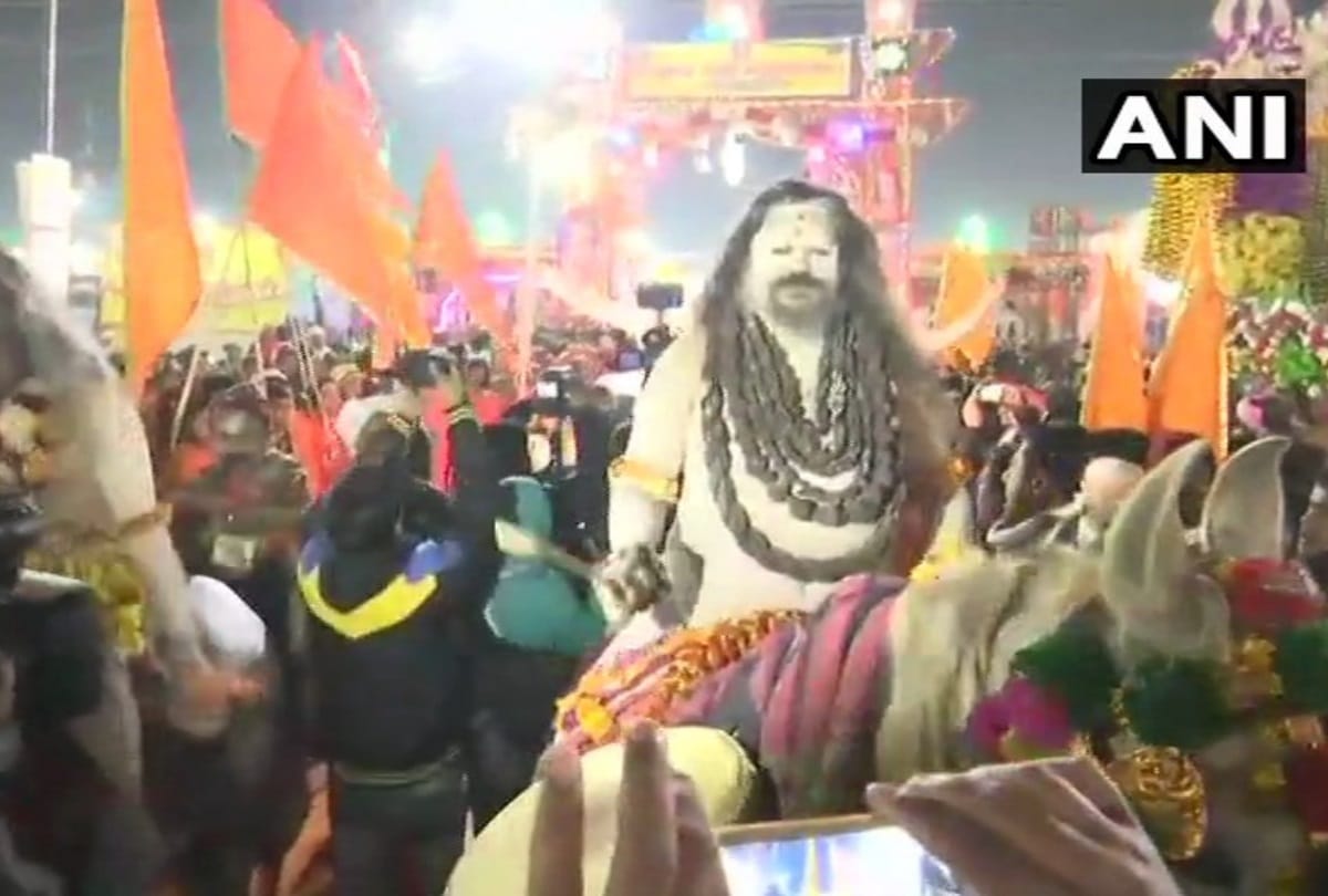 Hindu seers and saints head towards Sangam Ghat for a holy dip in river Ganga in kumbh 2019