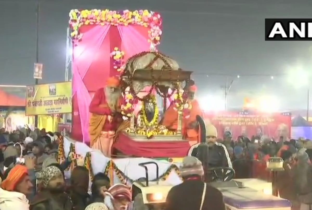 Hindu seers and saints head towards Sangam Ghat for a holy dip in river Ganga in kumbh 2019