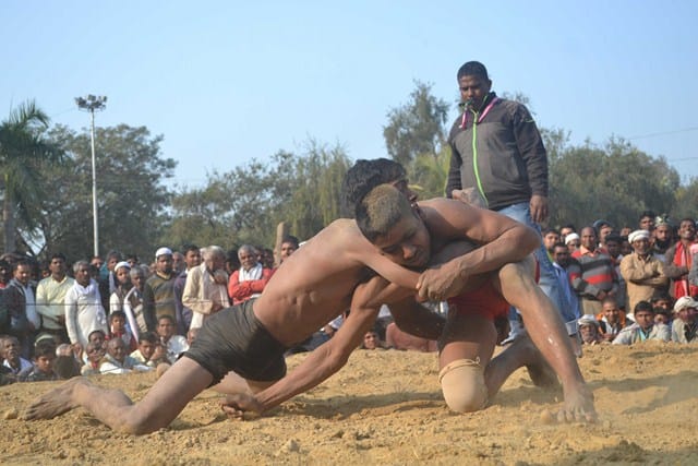 wrestlers show wins shown in the audience