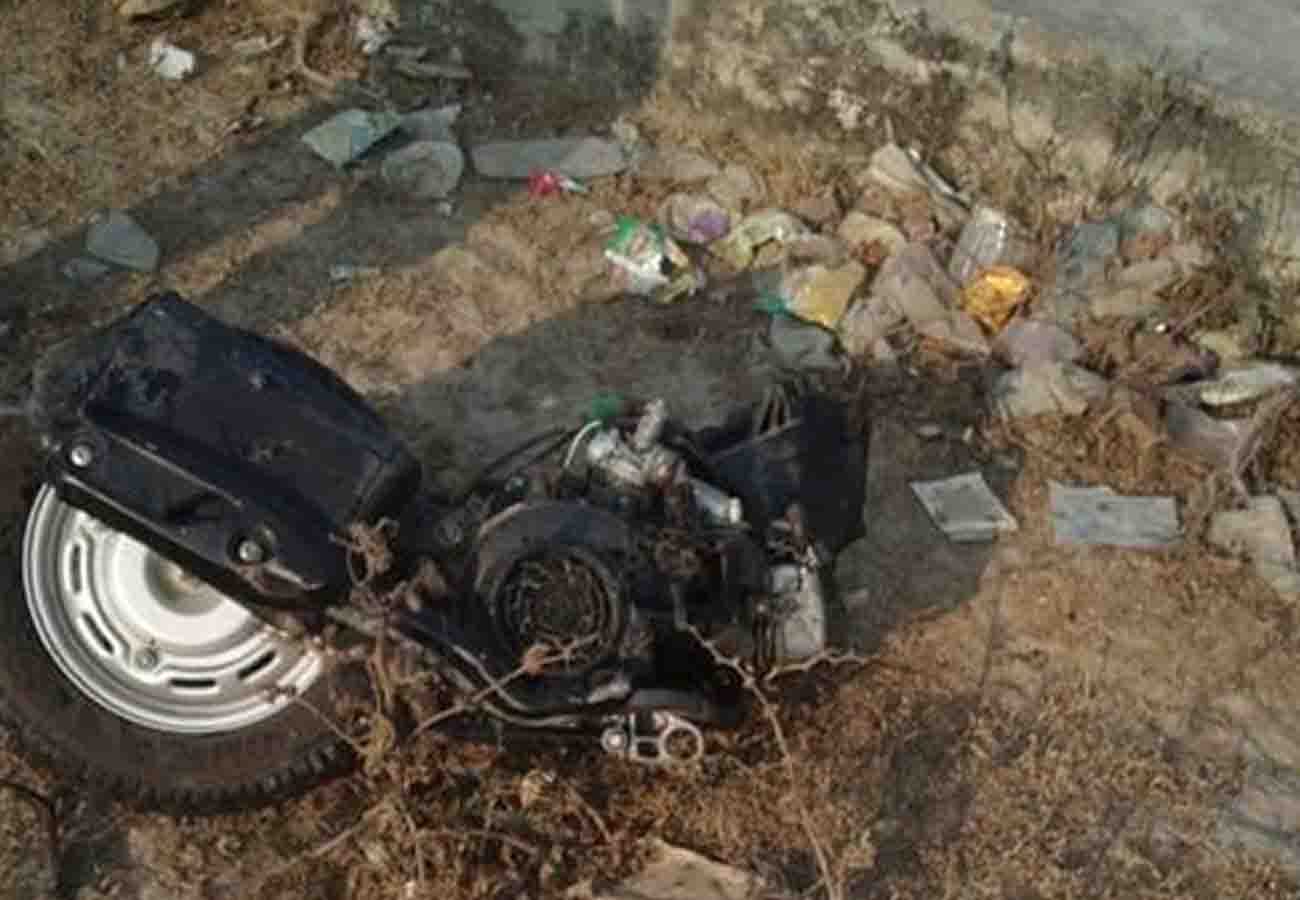 Scooty divided into two parts from collision of Mercedes