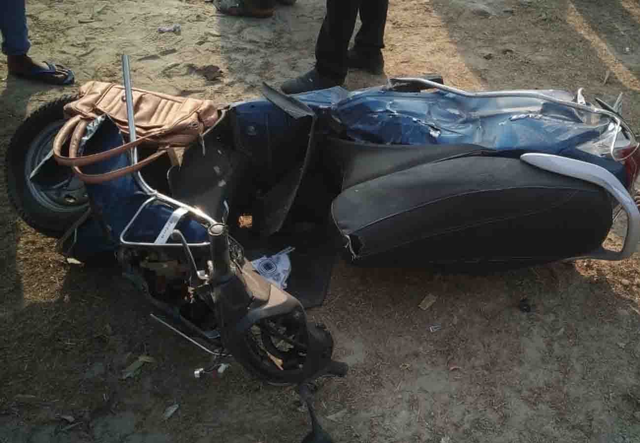 Scooty divided into two parts from collision of Mercedes