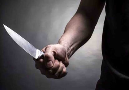 attack with knife on man in front of his brother