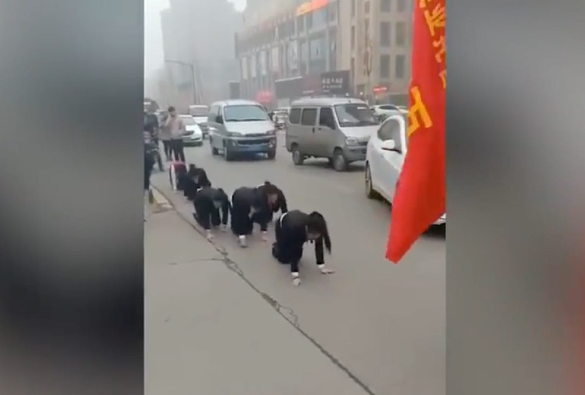 chinese company forced to punishment for employees to crawl on road for not completing targets