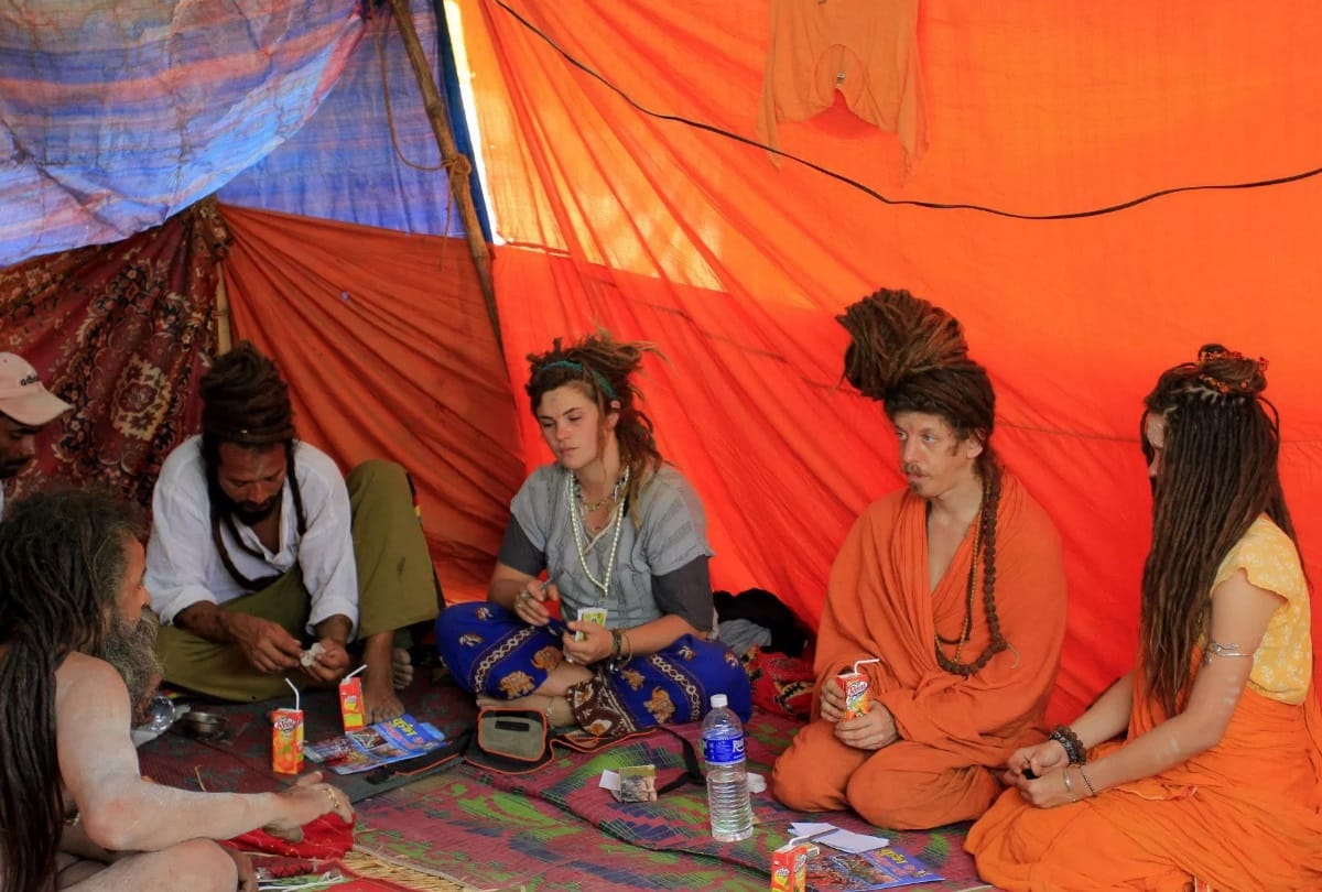 American saints eat Dal Bati in kumbh mela 2019 prayagraj