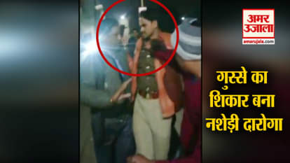 drunked police man beaten by public in kanpur