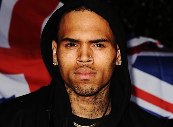 chris brown arrested in paris on suspicion of rape