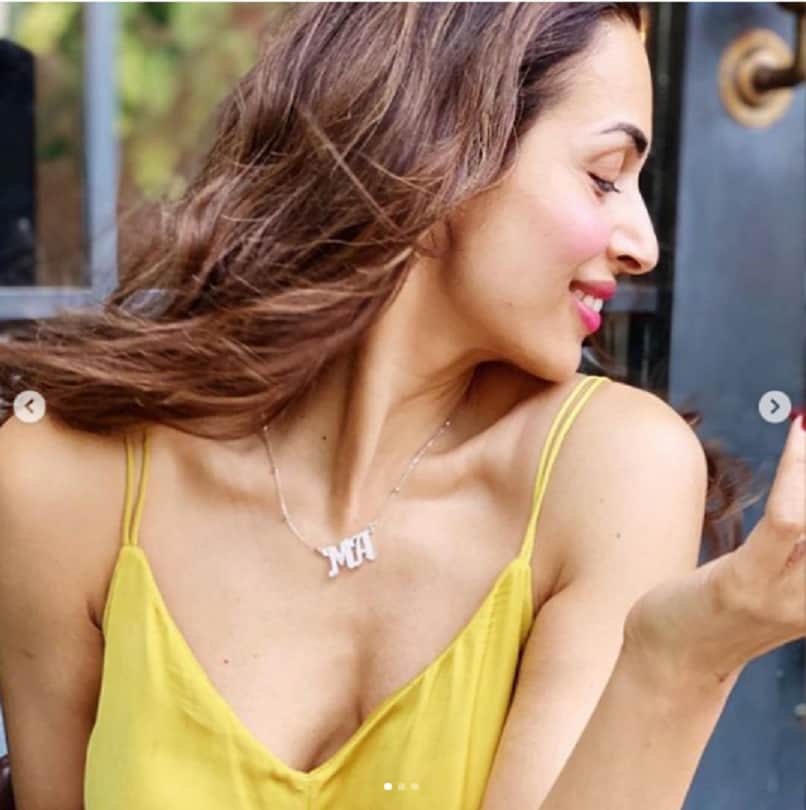 Malaika arora looks ravashing in lemon jumpsuit but her MA pendant is getting all the attention