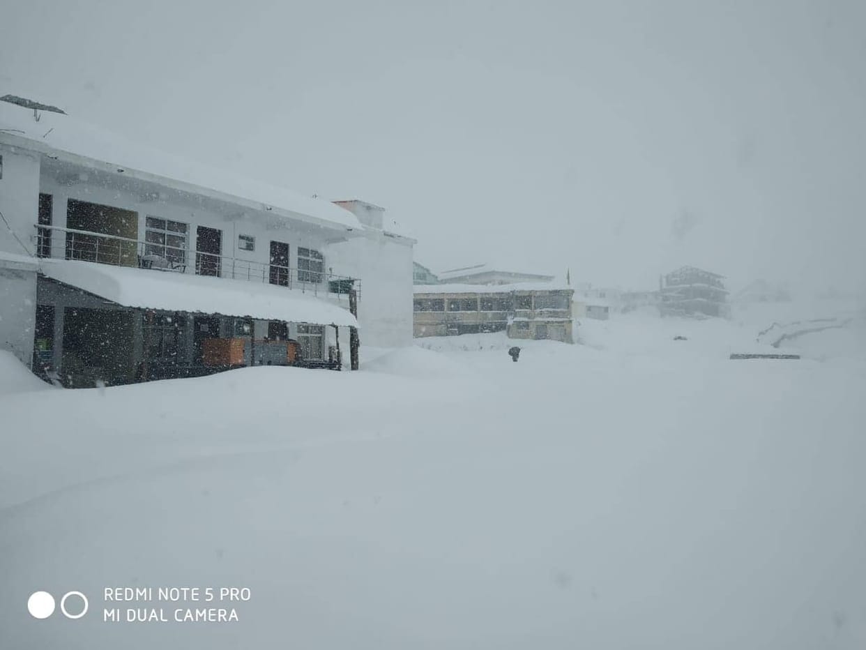 Snowfall covered uttarakhand hilly areas photos