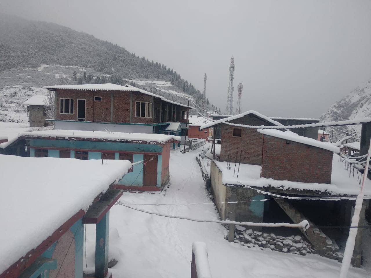 Snowfall covered uttarakhand hilly areas photos