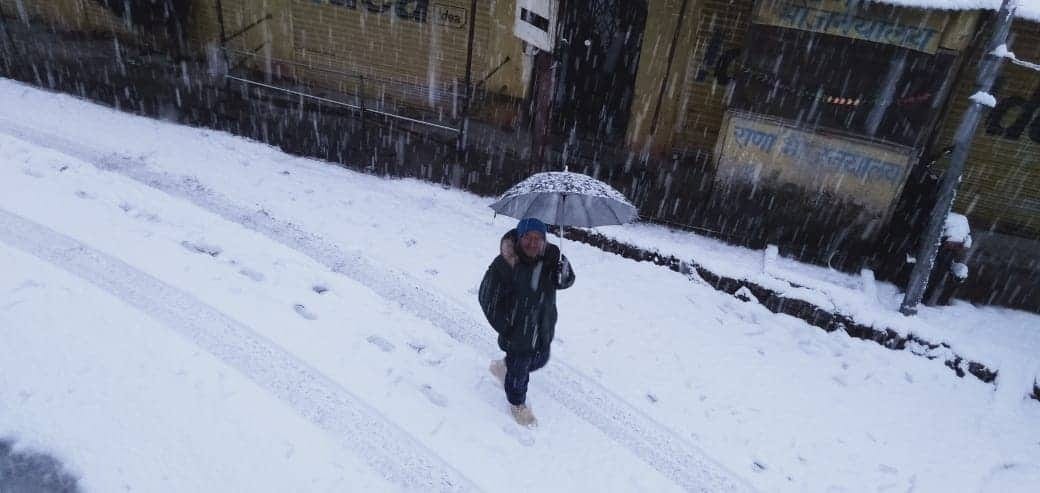 Snowfall covered uttarakhand hilly areas photos