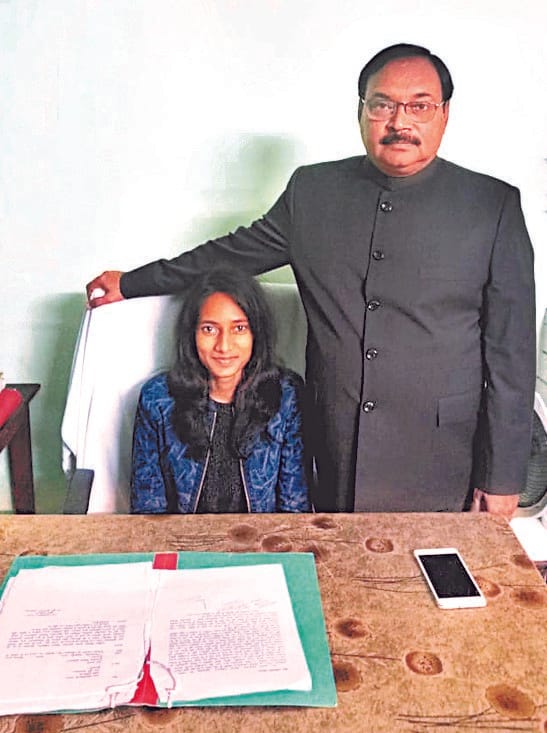 share a selfie with daughter at workplace on National girls child day in moradabad