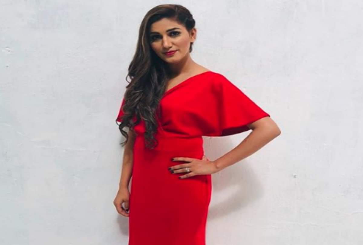 sapna choudhary new glamorous look in red gown