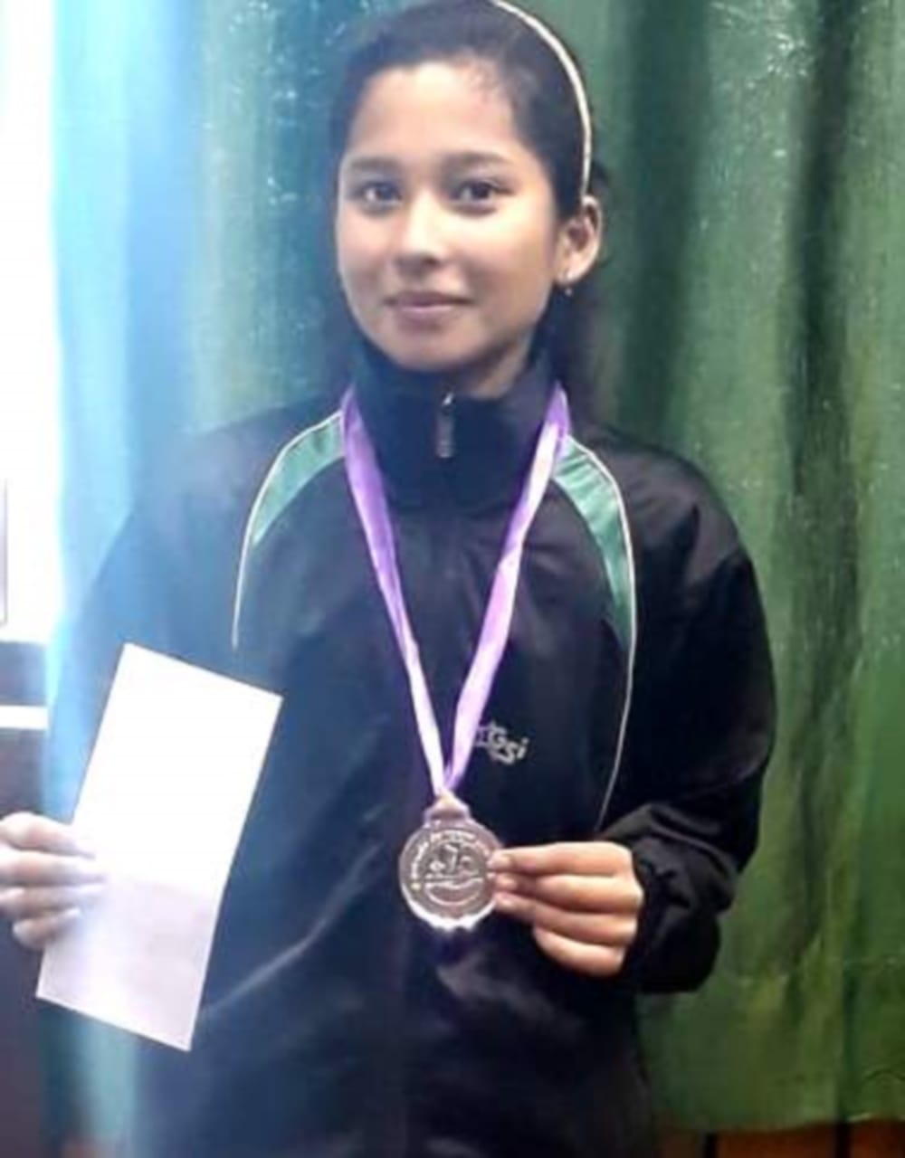 arpita got silver medal in state level badminton competition