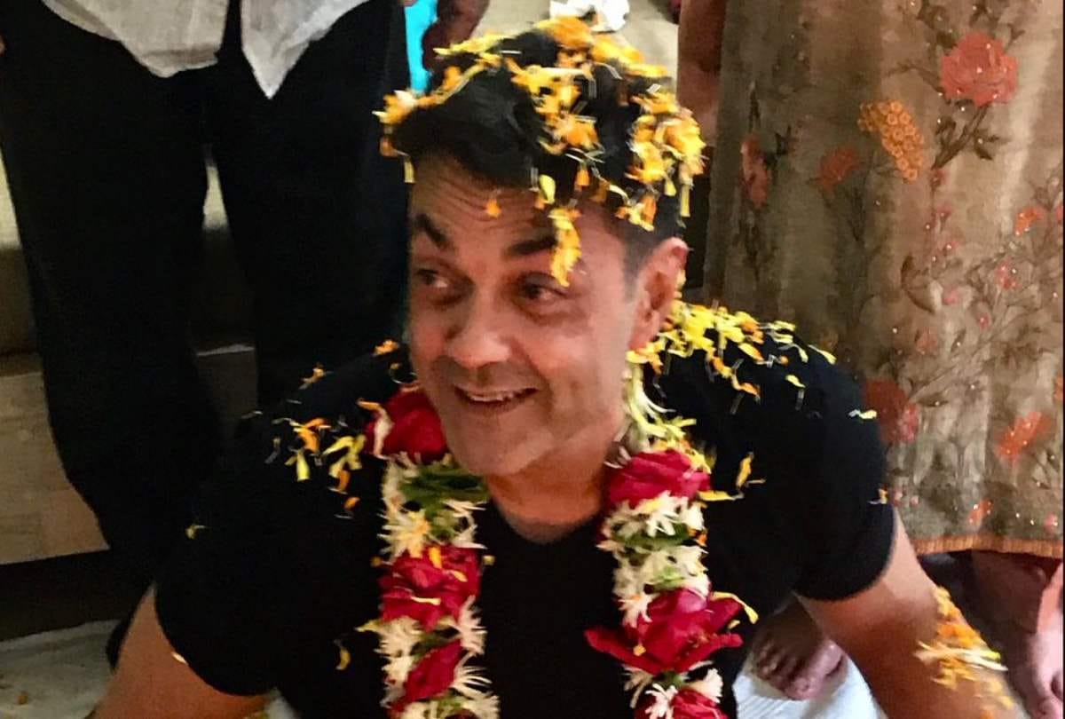 fan touch bobby deol feet at airport video viral