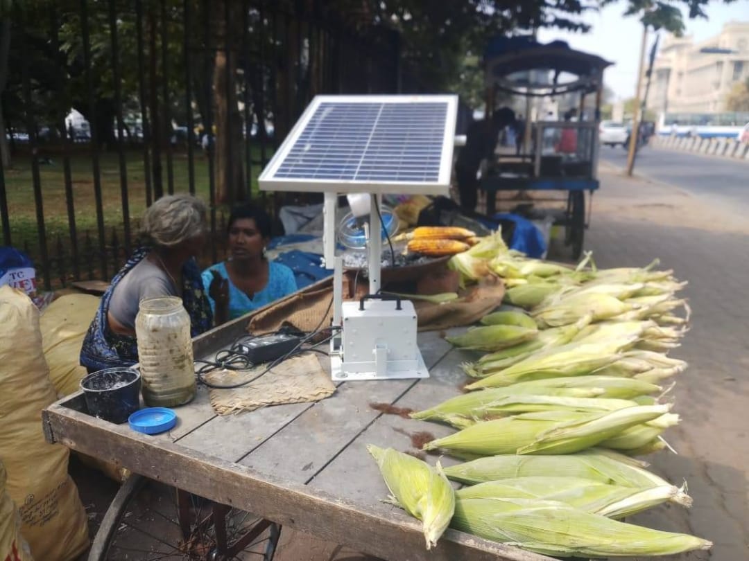 75 years old selvamma sells roasted corn outside bengaluru vidhan sabha uses solar fan