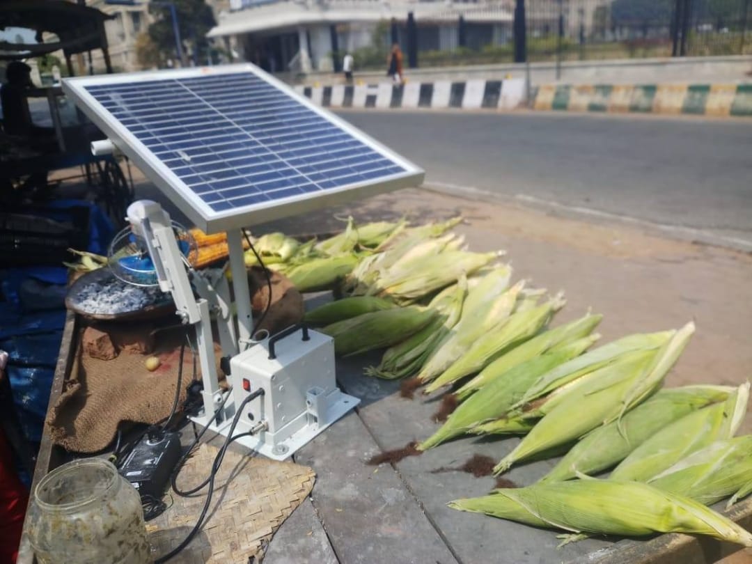 75 years old selvamma sells roasted corn outside bengaluru vidhan sabha uses solar fan