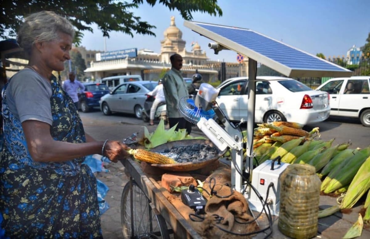 75 years old selvamma sells roasted corn outside bengaluru vidhan sabha uses solar fan