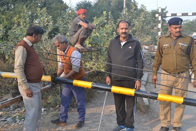 Pipe broken, chopped on crossing from truck collision