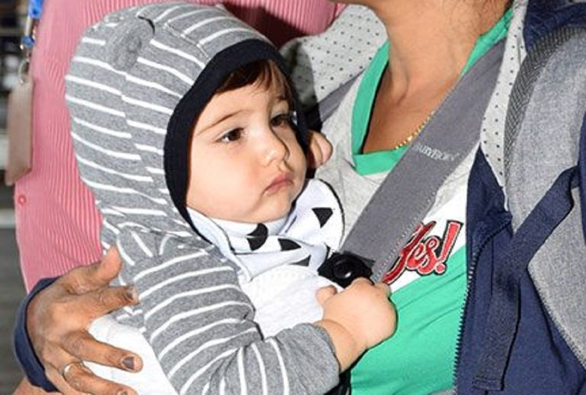 sunny leone is spotted at mumbai airport with twins
