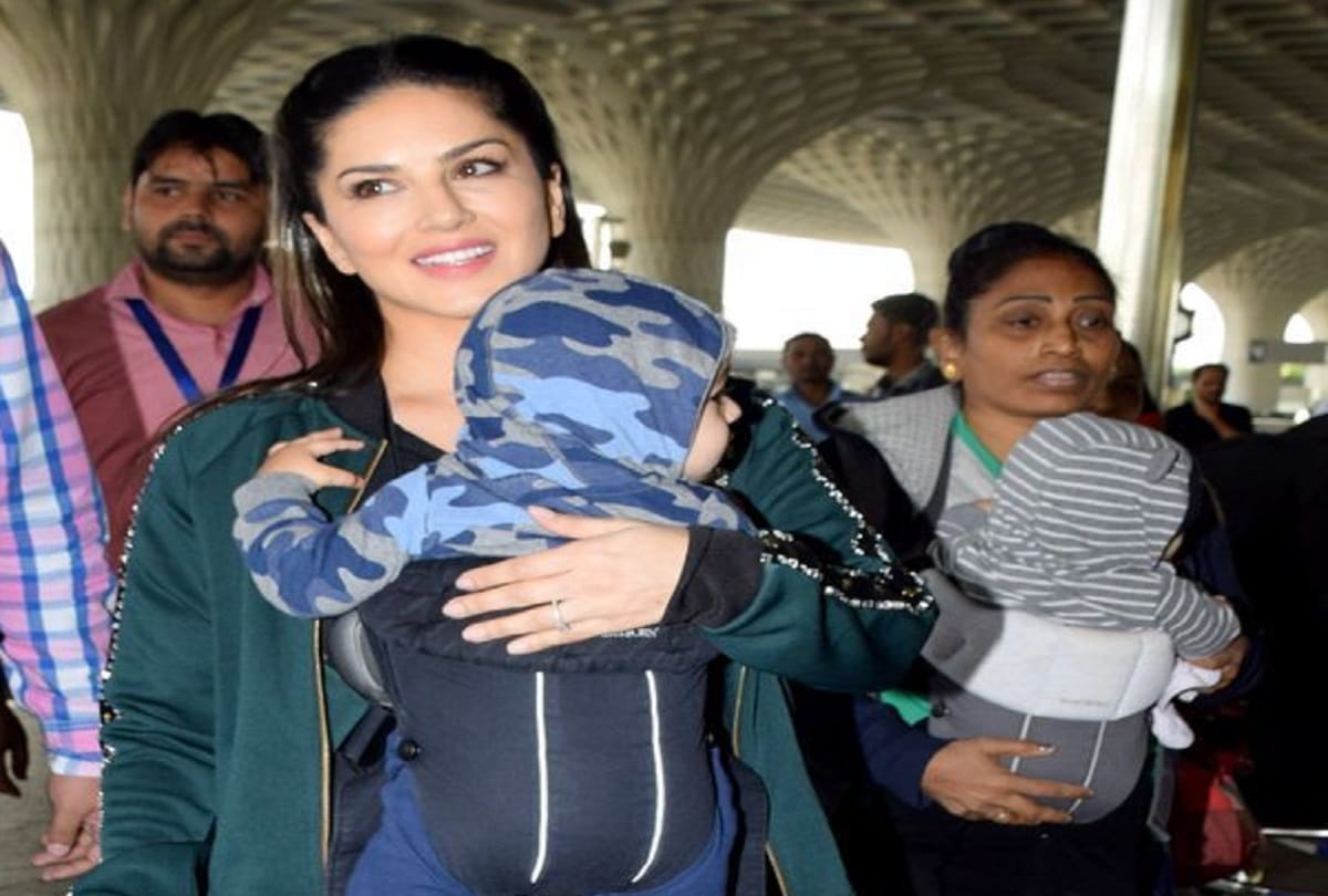 sunny leone is spotted at mumbai airport with twins