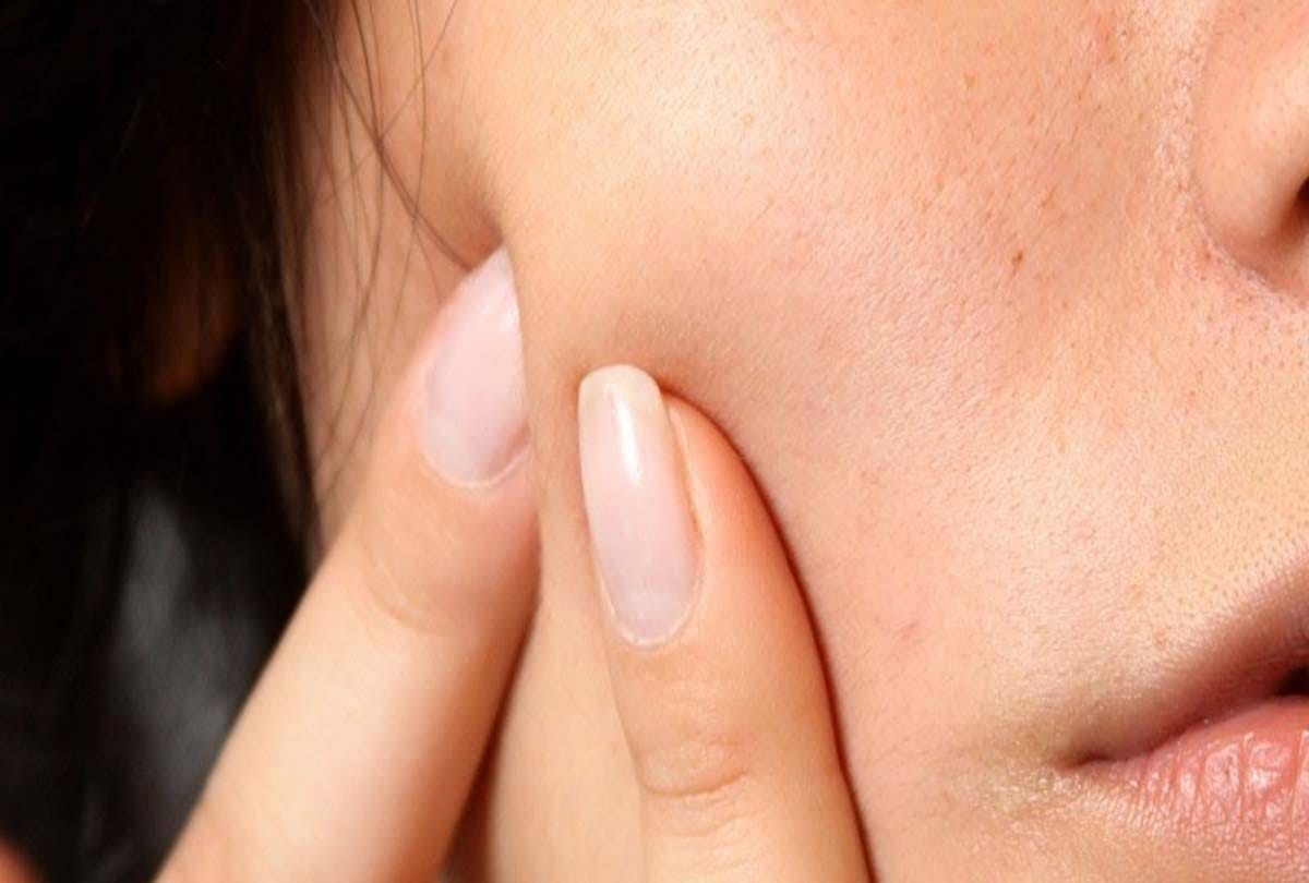 what does it mean if you have black spots on your body