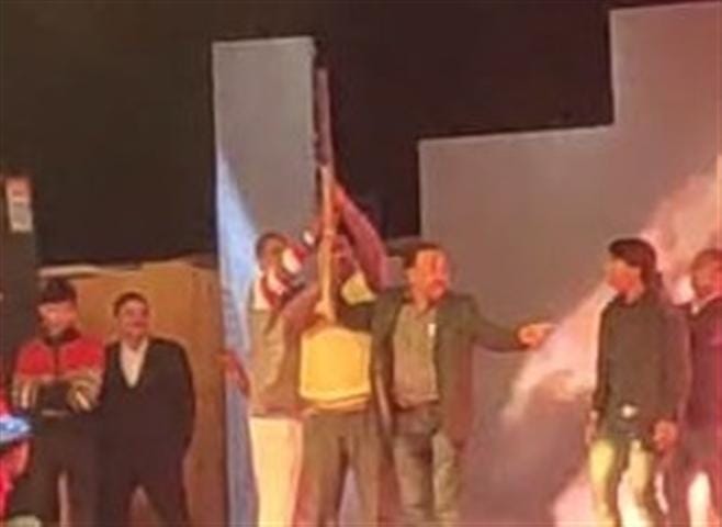 Harry firing on stage during Jayala at the wedding