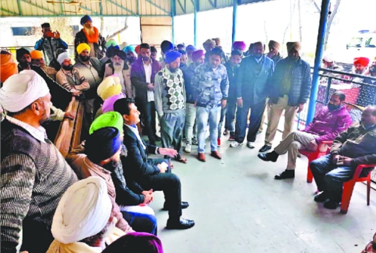 SDM meeting with farmer for acquisition in batala