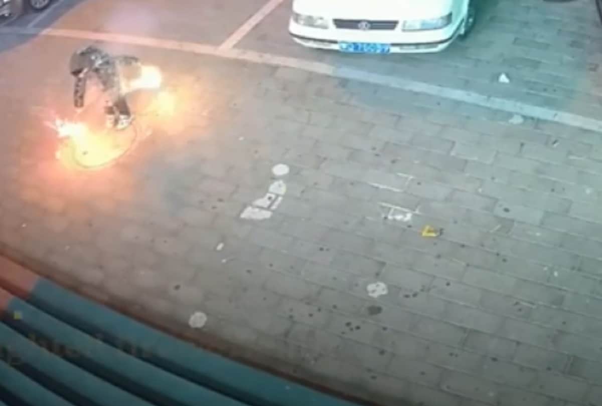 manhole explodes in china after boy drops lighted fireworks through cover