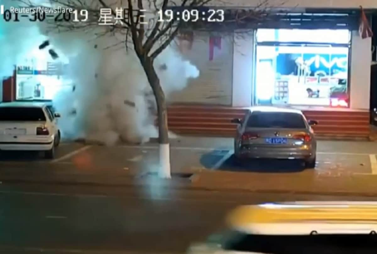 manhole explodes in china after boy drops lighted fireworks through cover
