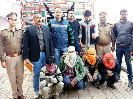 Truck recovered, four gangsters arrested