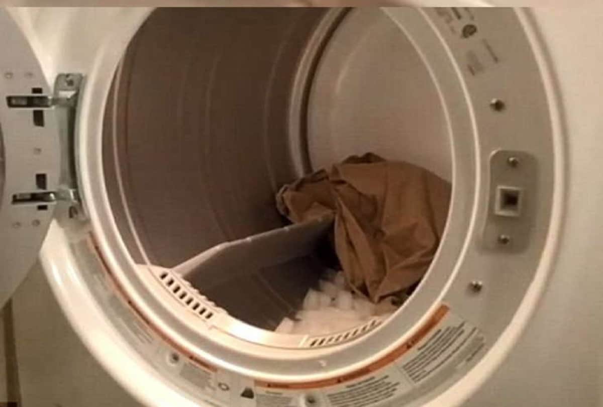 woman always put ice cubes with clothes in washing machine dryer for drying cloths