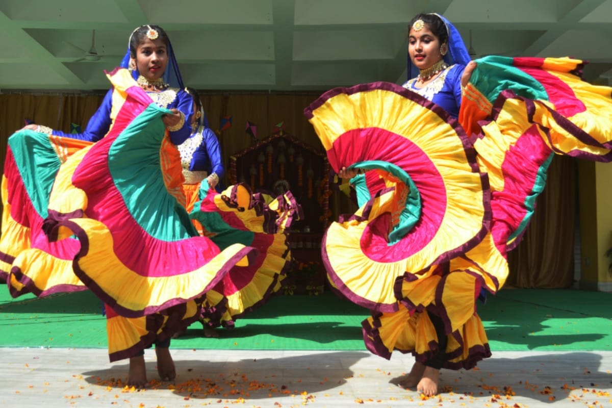 Girls perform dance on Basant panchmi kis plays with colorful kites