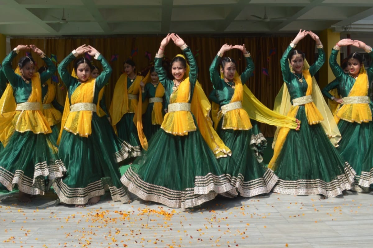Girls perform dance on Basant panchmi kis plays with colorful kites