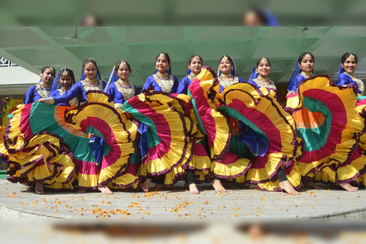 Girls perform dance on Basant panchmi kis plays with colorful kites