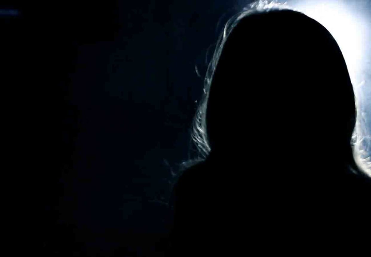 woman in room with her boyfriend and husband was sleeping