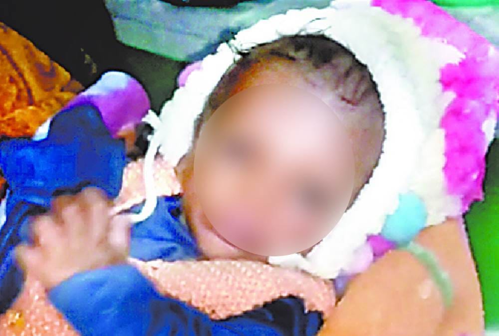 three months old baby found in bushes with brand new clothes on