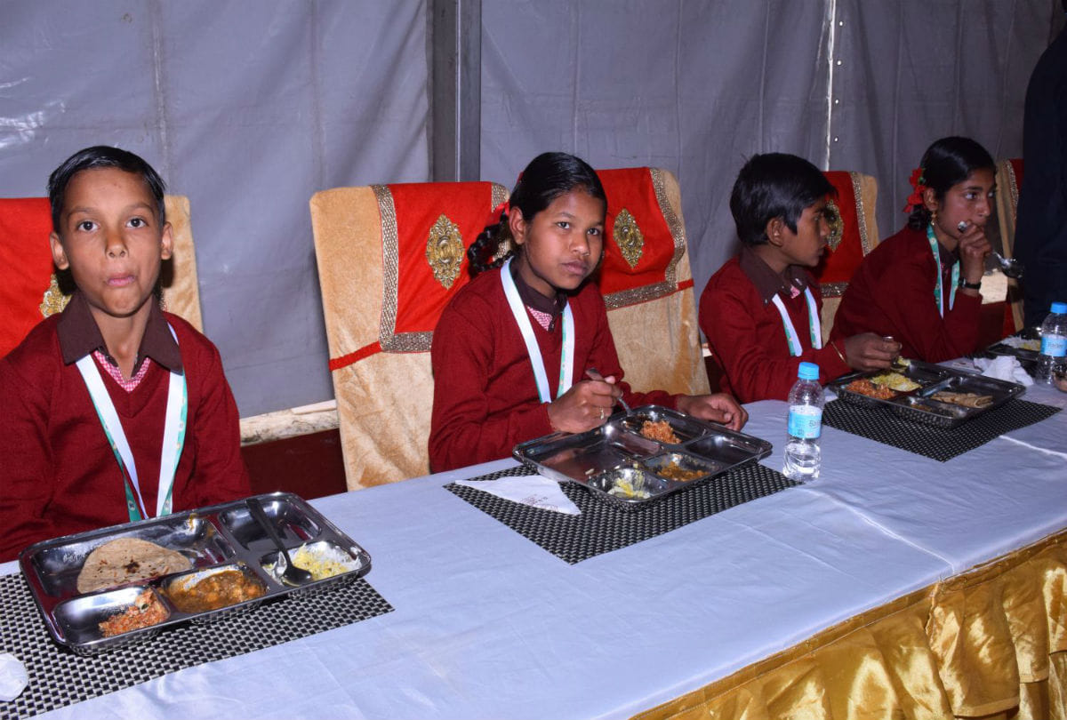 narendra modi, ram naik and yogi adityanath serving meal to children