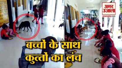 children having mid day meal with dog in Kanpur government school