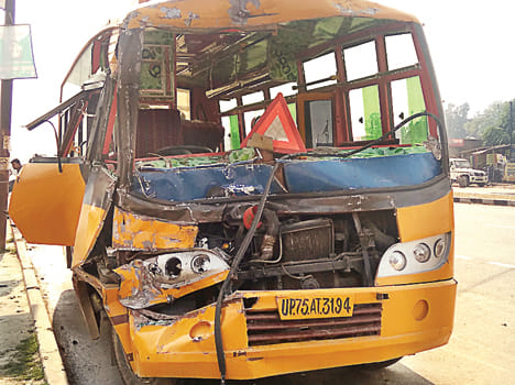 Bus collides with truck, 15 injured