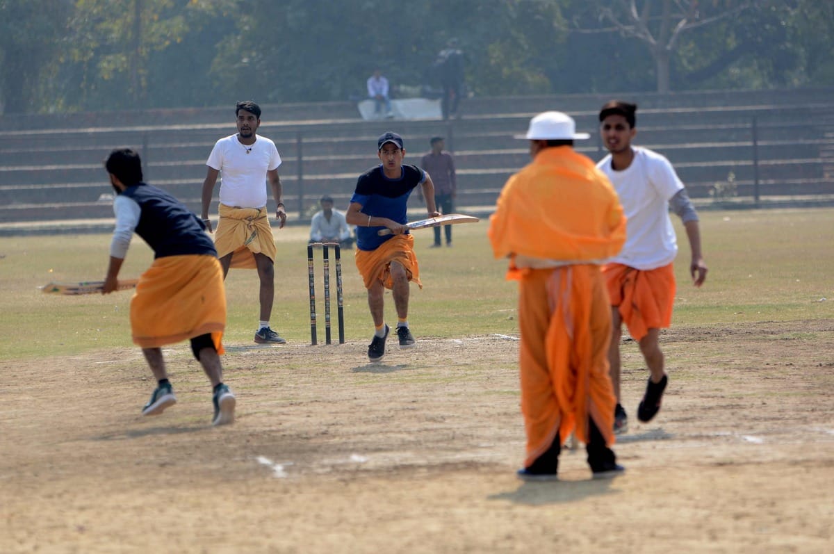 Cricket played in dhoti and commentry in sanskrit language in varanasi