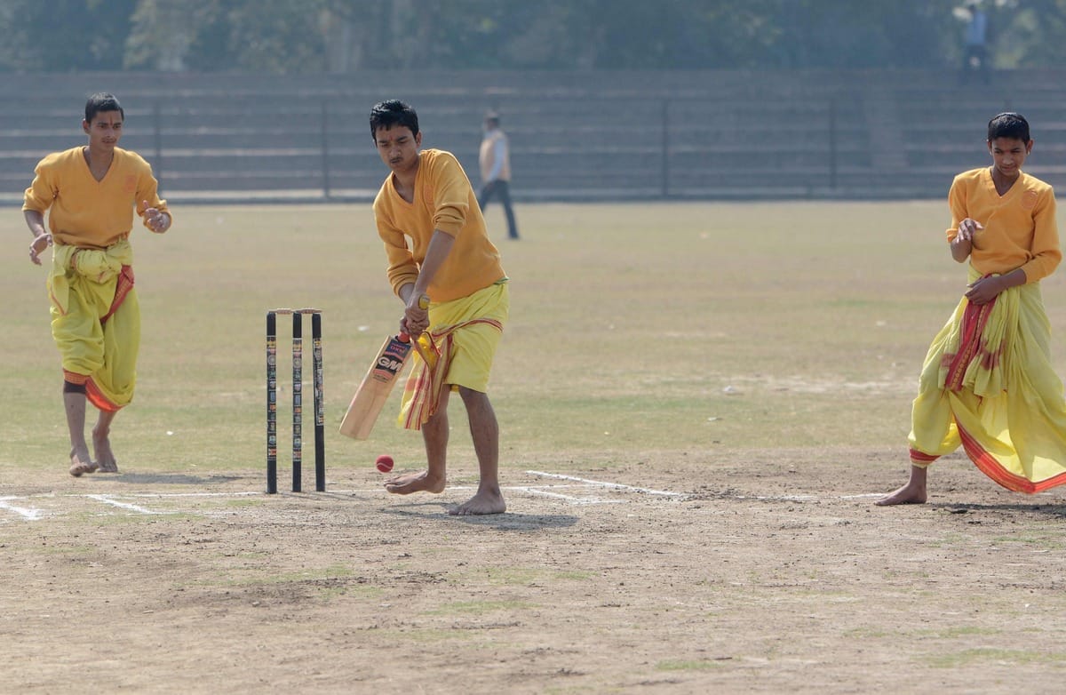 Cricket played in dhoti and commentry in sanskrit language in varanasi