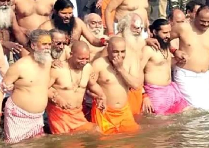 Narendra Modi Amit Shah Smriti Irani Yogi take holy dip during Kumbh Mela 2019