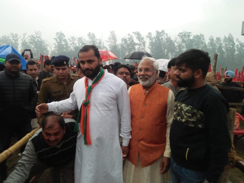 PM Narendra modi lok sabha election 2019 people waiting in rain rudrapur