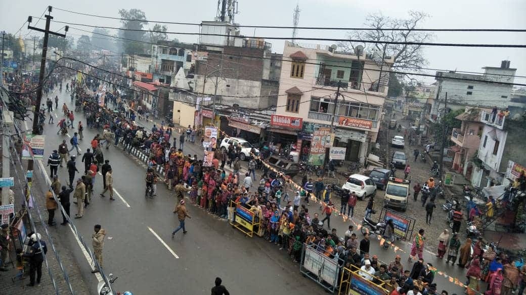 PM Narendra modi lok sabha election 2019 people waiting in rain rudrapur