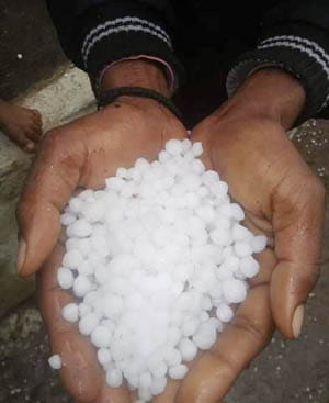 hailstrom fall with rain