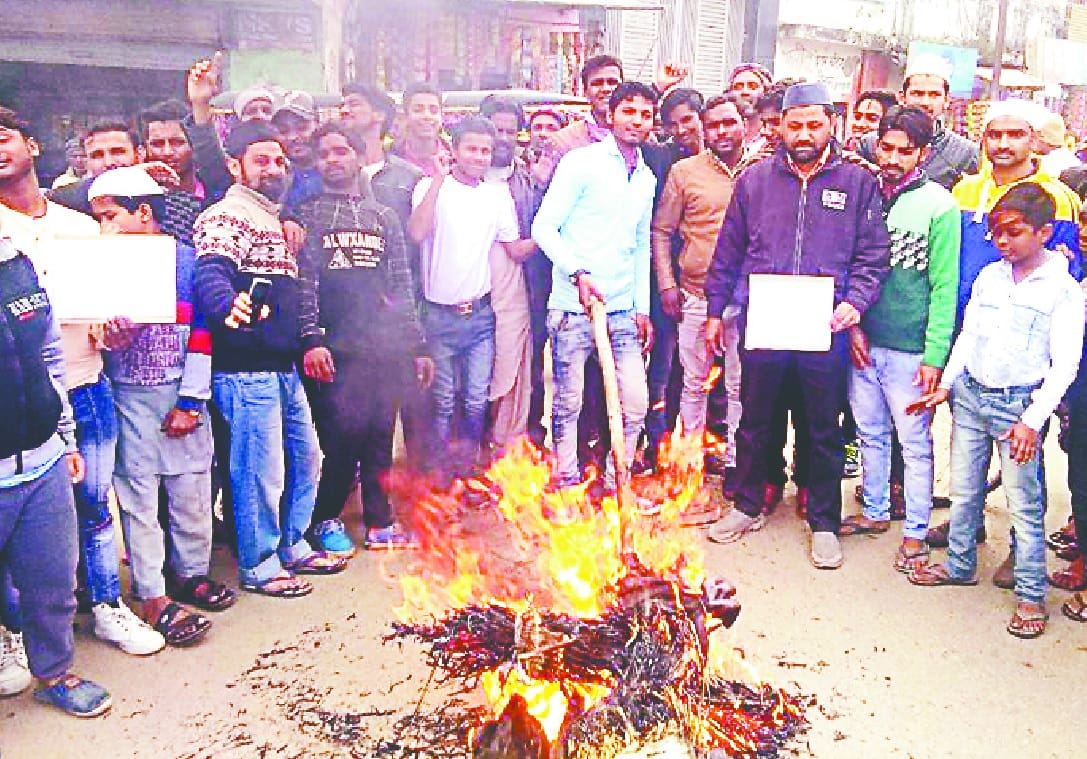 Blow the effigy of Pak, candle burns tribute
