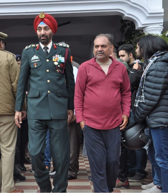 CM yogi adityanath father Meet Martyred Major Chitresh father in dehradun photos